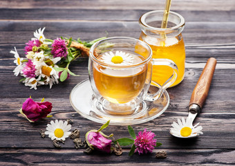 Herbal tea with honey and flowers. Flowers tea.