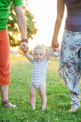 Young Attractive Parents and Child Portrait Outdoors