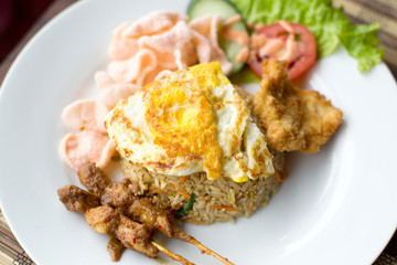 Nasi Goreng with prawn crackers and chicken satay