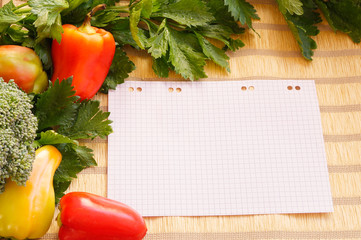 Fresh vegetables with paper for notes