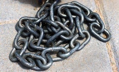 Closeup of chains on the floor