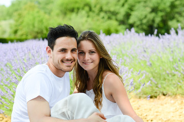 Obraz premium romantic young couple man woman summer lavender field provence