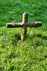 Cross in the grass