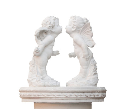 sculpture of two white kissing angel