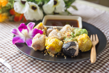 Shumai. Steamed homemade shrimp and chicken dumpling with house