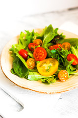 Green salad with colorful tomatoes