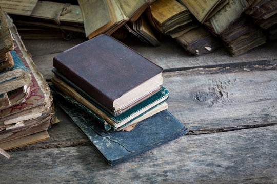 Vintage old books on wooden table