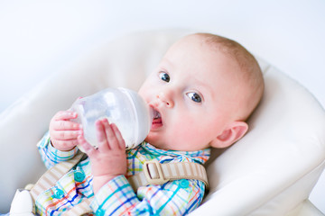 Baby boy drinking milk