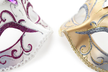 Carnival mask in spotlight on white background