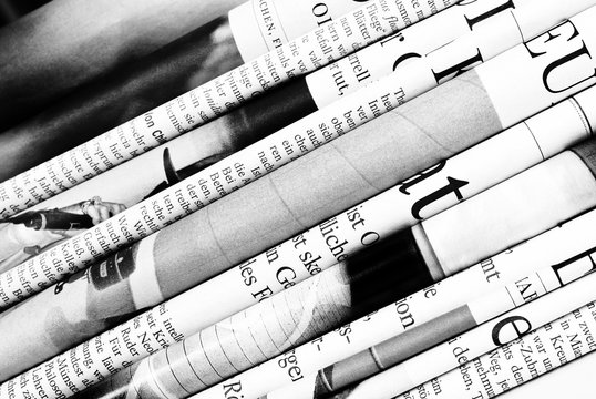 Folded newspapers background