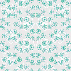 Seamless decorative floral pattern with clover, shamrocks