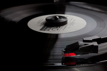 Retro vinyl music audio player with needle © themanwhophoto