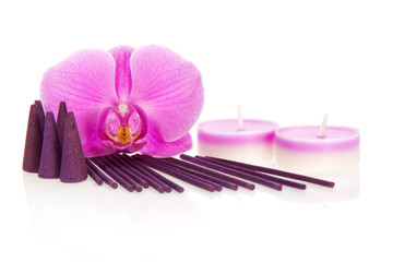 Orchid flower, aromatic sticks and cones