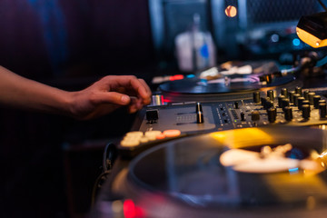 Dj mixing in night club