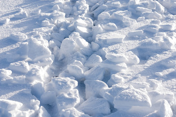 Broken pieces of snow