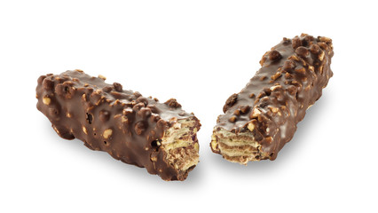 Broken waffle in chocolate with shredded nuts isolated on white