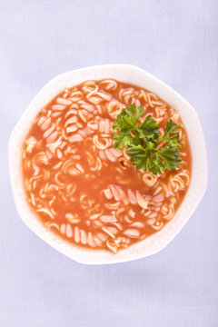 tomato soup with pasta and parsley