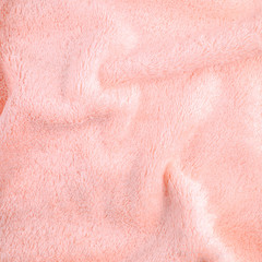 pink texture of bath towel folded as a background
