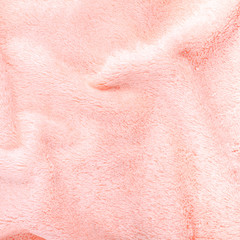 pink texture of bath towel folded as a background