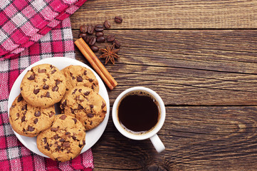 Cup of coffee and chocolate cookies