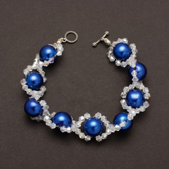 Expensive bracelet with swarovski crystals isolated on the black