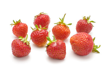 Many strawberries isolated on the white background