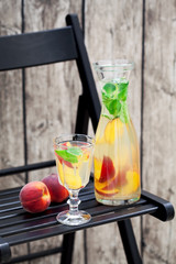 Homemade peach mint lemonade, selective focus