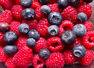 Raspberry and blueberry background 
