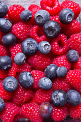 Raspberry and blueberry background 