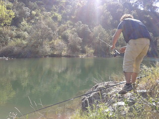 Pescador en el lago