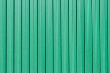 The green corrugated metal walls, background