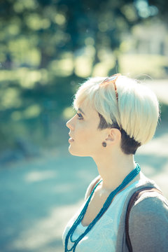beautiful young blonde short hair hipster woman