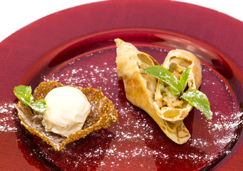 strudel with ice cream on a white background in restaurant