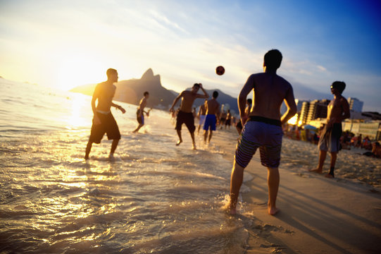 Beach Soccer Brazilians Playing Altinho in the Waves