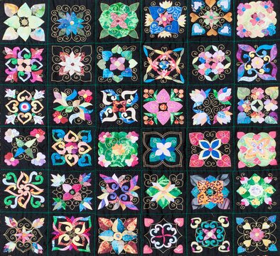 Hand stitched colorful patchwork quilt
