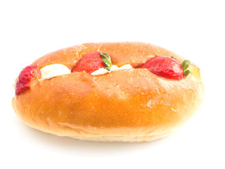 Bun with soft cream and strawberry