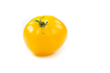 yellow tomato isolated on white