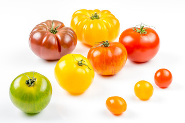 Many varieties of colorful tomatos