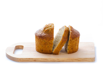 Banana cake on chopping board. Isolated
