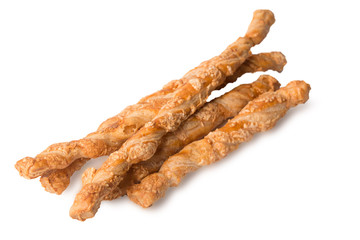 Stack of sweet crispy baked sticks isolated on white