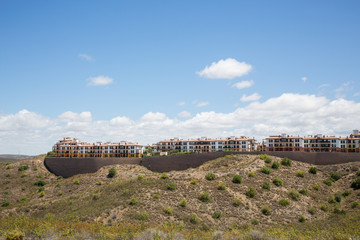 Apartments on the ridge of a hill top