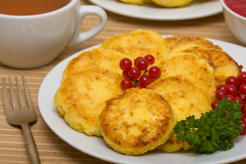 Sweet cheese pancakes on a plate