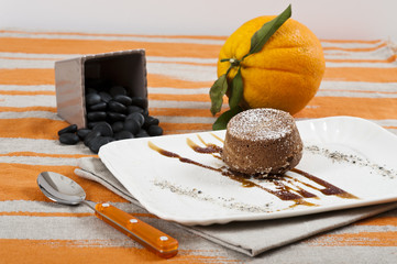 Chocolate flan with orange and licorice