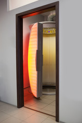 Stand up tanning bed