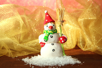Beautiful snowman and Christmas decor, on bright background