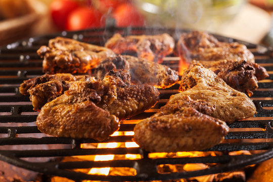 Grilling Chicken Wings On Barbecue Grill