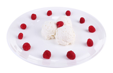 Creamy ice cream with raspberries on plate, isolated on white