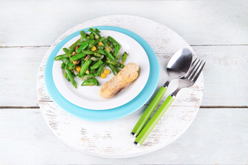 Salad with green beans, ham and  corn