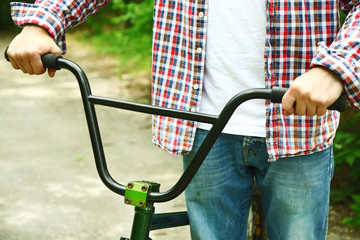 Young boy on BMX bike at park