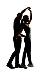 Silhouette of Asian couple dancing